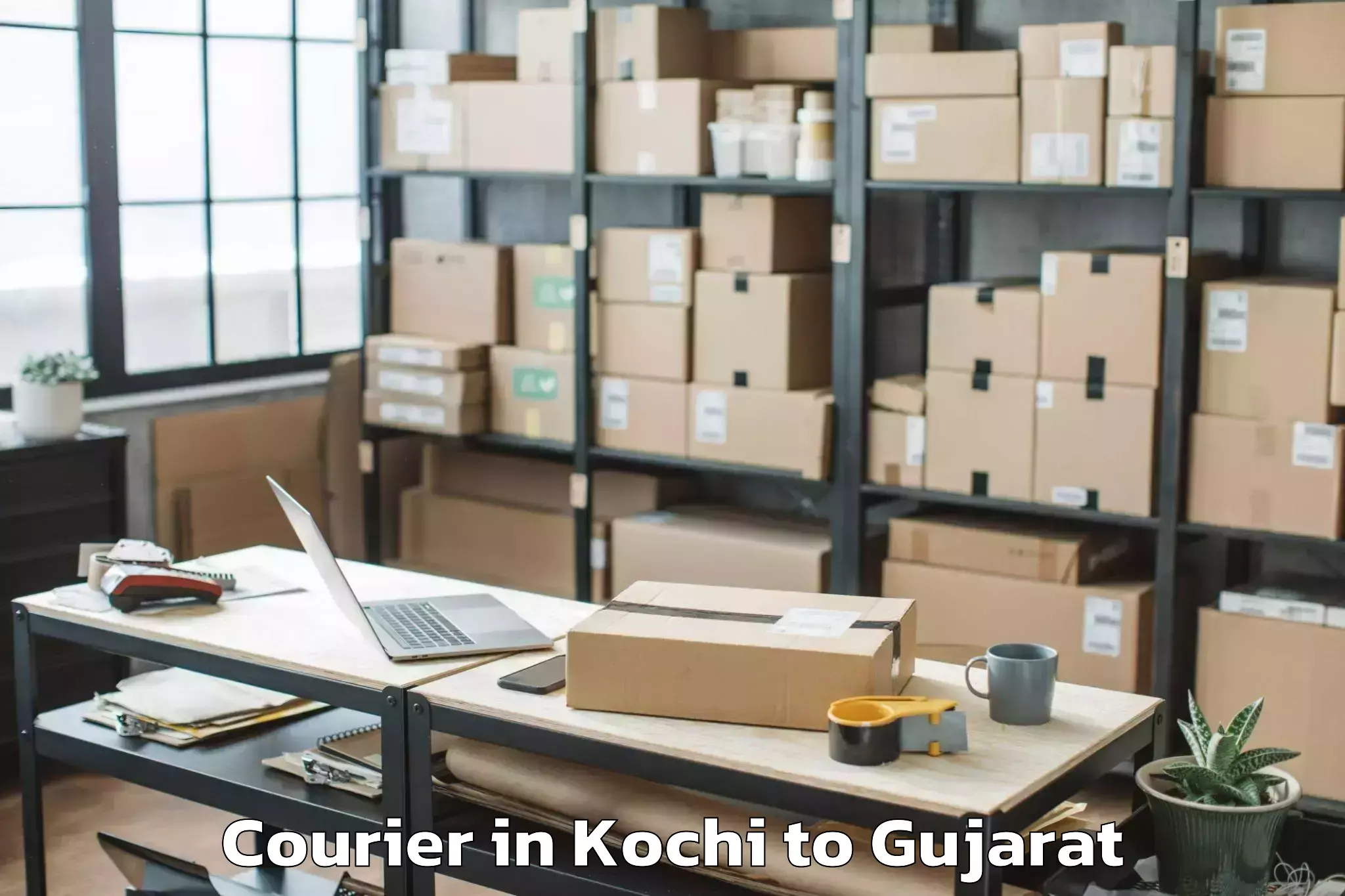 Book Kochi to Abhilashi University Rajkot Courier Online